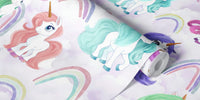 Cute Baby Unicorns on a Pastel Sky Mural by HappyWall